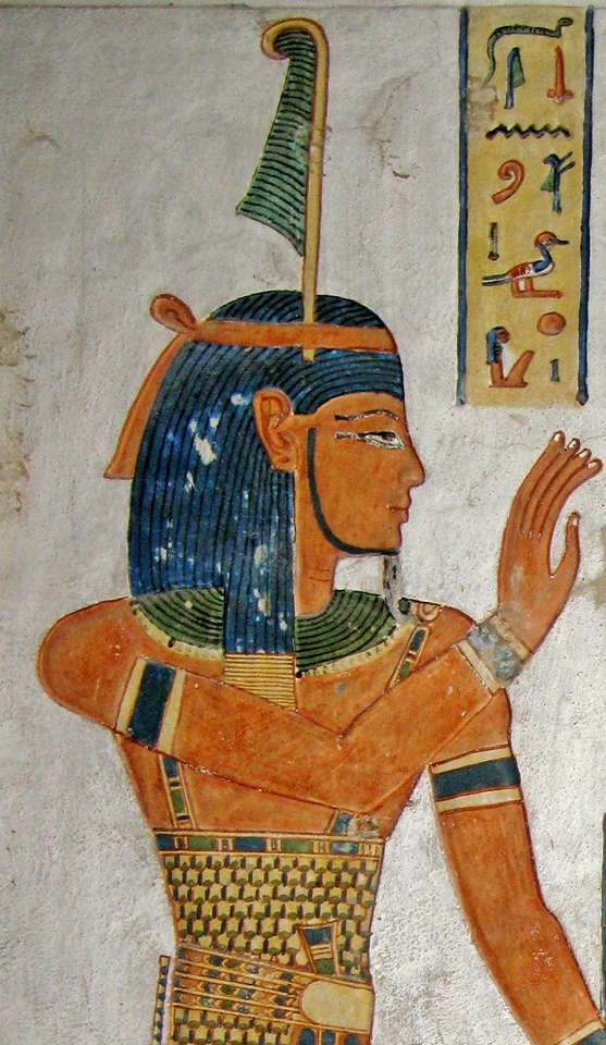 Detail from the “House of Eternity” of the Royal Prince Khaemwaset, son of King Ramses III, QV44, west ‘Uaset’-Thebes: the God Shu son of Ra with His right hand raised in blessing, and wearing the feather. https://amentetneferet.wordpress.com/gods/the-great-ennead-of-heliopolis/shu/