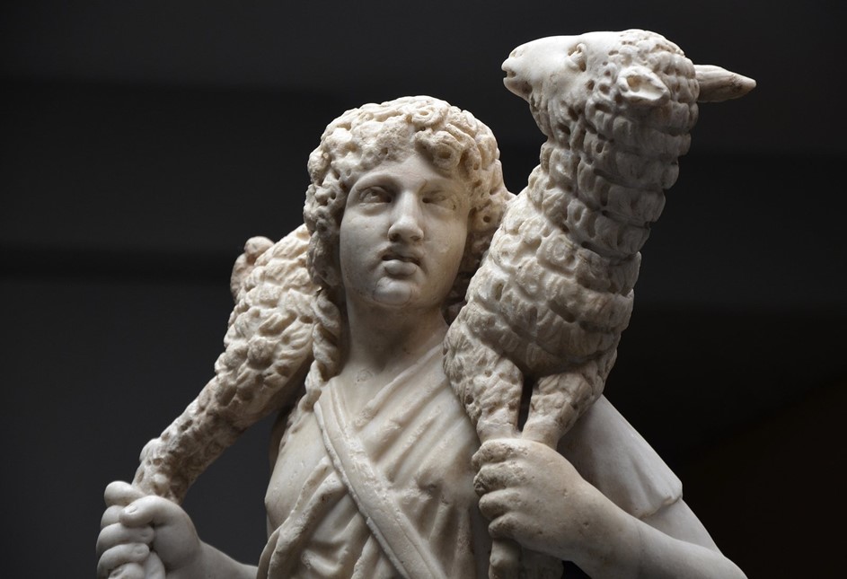 Hermes Kriophoros transformed into "Christ, the Good Shepherd". 3rd century statue from the Catacombs of Domitilla in Rome (Vatican Museums)