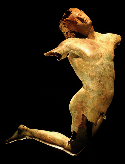 A Roman bronze copy of Praxiteles’ Dancing Satyr (4th century BC), found in the sea off the coast of Sicily. There are numerous complete copies in marble and bronze of the whole figure.