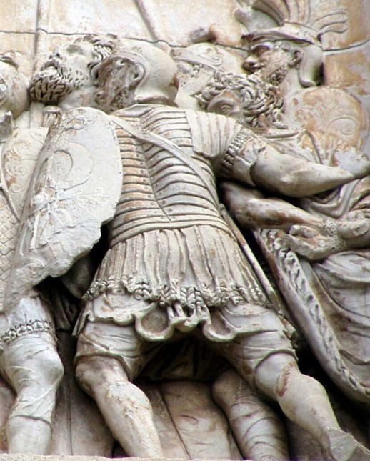 Detail of Arch of Constantine: Detail of relief panel, south side, right panel of left arch. A legionar wearing lorica segmentata.