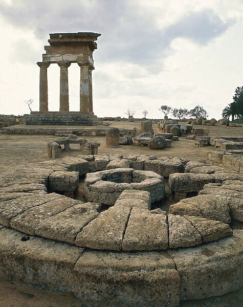 View of a circular altar with the well a offering (Bothros), sanctuary of the Greek deities Chthonian (photography) by Greek; Agrigento, Sicily, Italy. https://www.mediastorehouse.com/fine-art-finder/artists/unknown-artist/view-circular-altar-offering-bothros-23328992.html